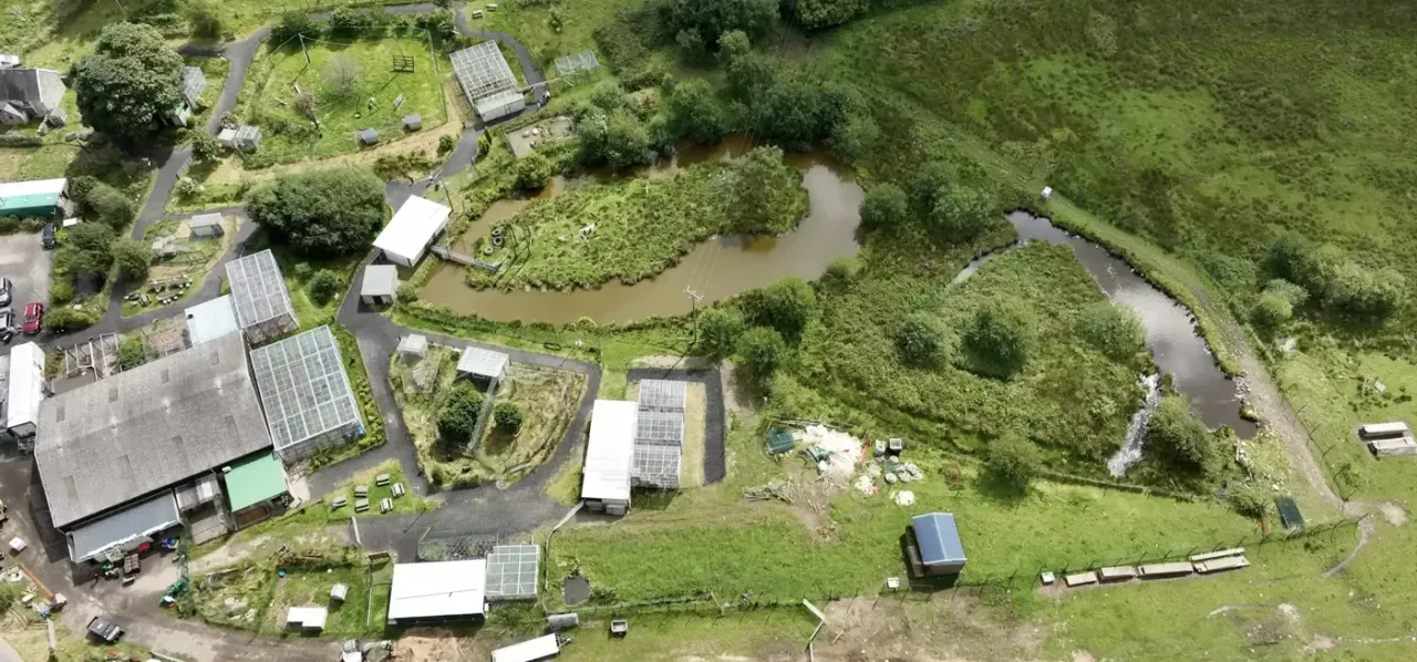 Aerial drone view of Wales Ape & Monkey Sanctuary site in the Brecon Beacons